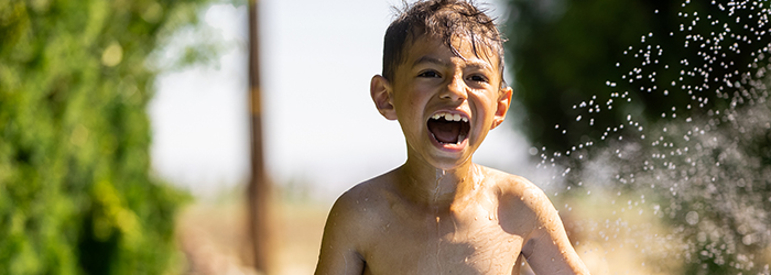 Tiago after going down a slip and slide.