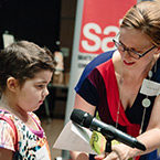 A child prepares to read a poem