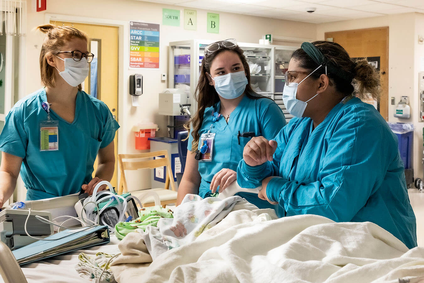 Nurses engage in conversation.