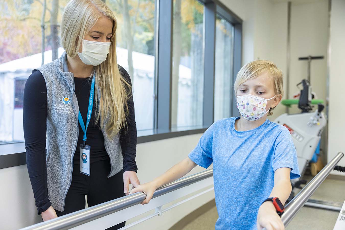 Kaycee Howell and patient doing rehab exercises