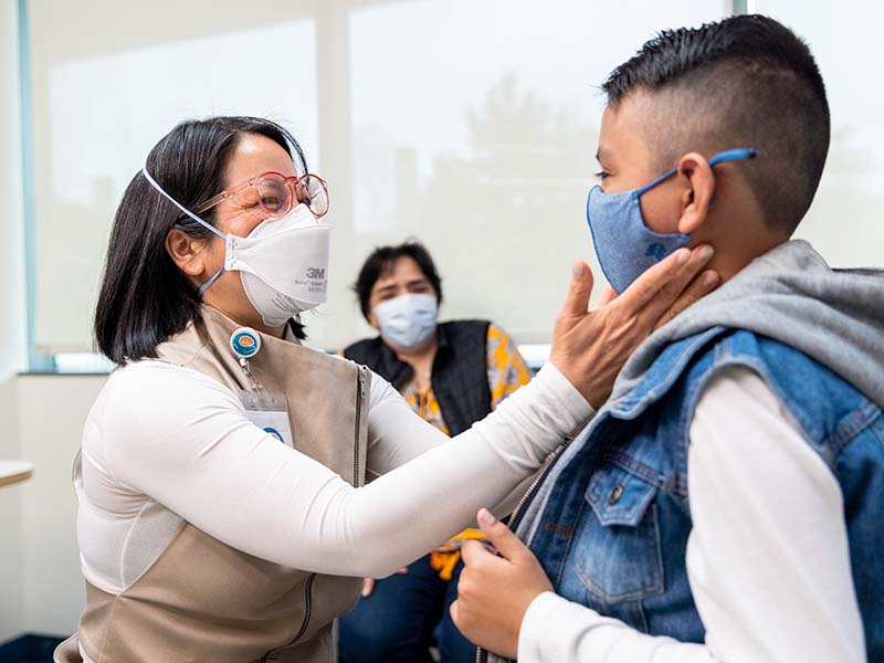 A boy is examined at one of Seattle Children's Urgent Care clinics.