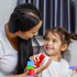 Adult and child playing with colorful blocks