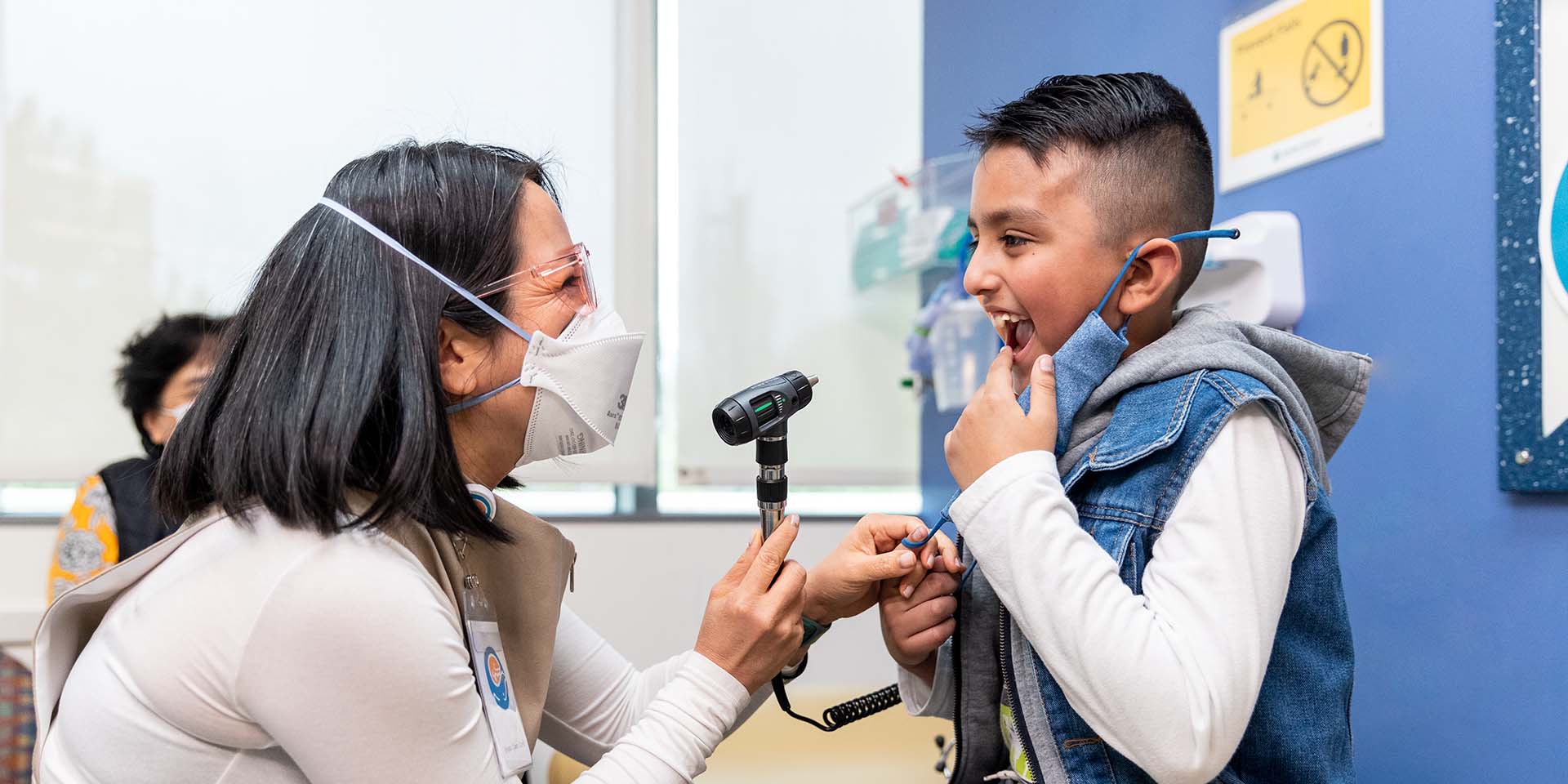 A doctor examines a boy at Seattle Children's